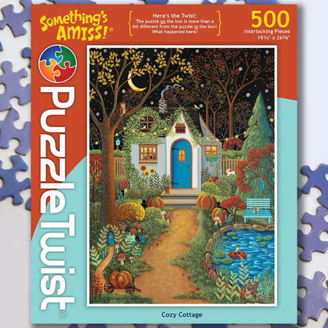 500-piece puzzle box showing nighttime scene with a cottage, pumpkins, pond, and colorful trees in Scandinavian folk art style.