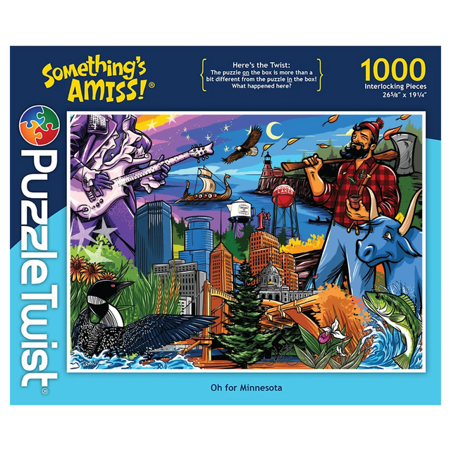 Puzzle box with colorful illustration of Paul Bunyan, Babe the Blue Ox, city skyline, wildlife, river, and text “Somethings Amiss! 1000 piece puzzle.”.