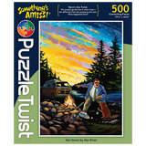 500 piece jigsaw puzzle showing Adam Turman’s illustration of a man by a van near a river at sunset, roasting marshmallows. “Somethings Amiss!” is visible on the box.