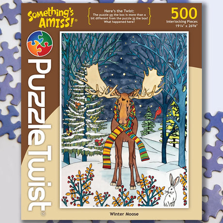A 500-piece puzzle showing a moose in a colorful scarf standing in a snowy forest with a rabbit nearby.
