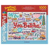 1000-piece puzzle box with Minnesota slang such as “You Betcha!” shown in playful fonts, surrounded by cartoon doodles and bright accents on a white background.