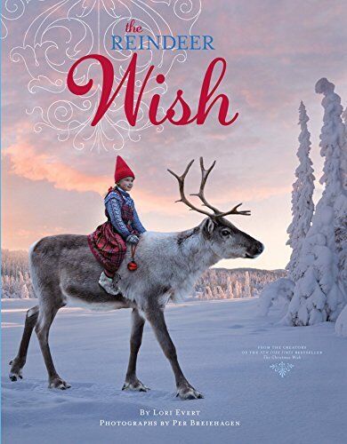 In a snowy landscape, a child dressed in winter attire gently sits atop a standing reindeer, with "Reindeer Wish" captivating young readers at the top of the image.