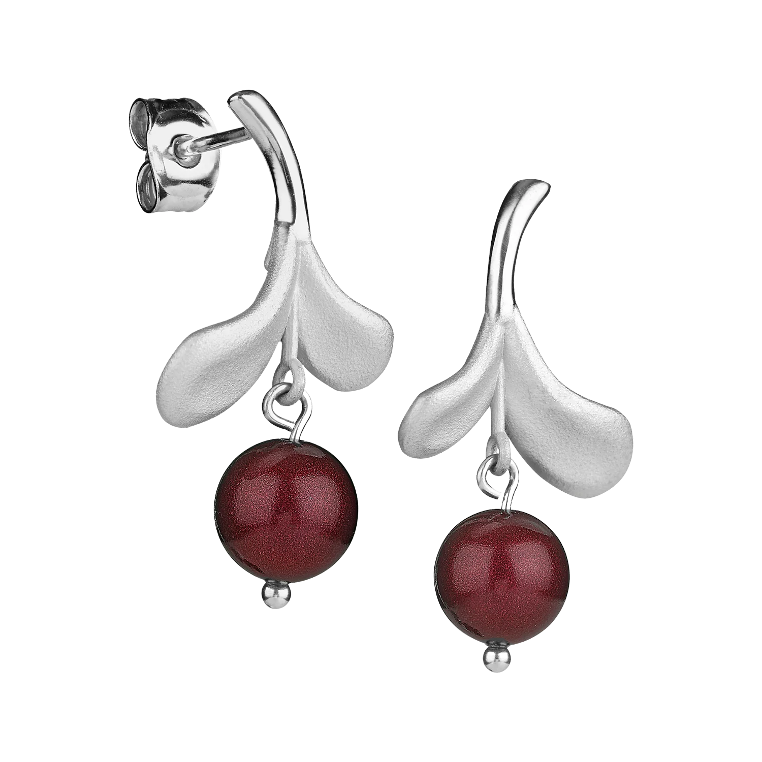 Introducing our Lingonberry Silver Earrings, featuring a unique Scandinavian design. These silver earrings showcase a delicate leaf motif paired with dangling red spheres resembling lingonberries, making them a standout piece from Finnfeelings jewelry.