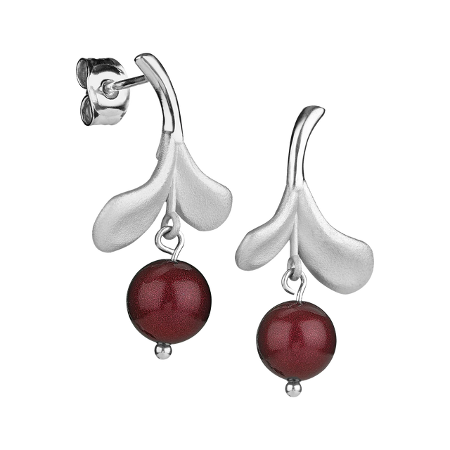 Introducing our Lingonberry Silver Earrings, featuring a unique Scandinavian design. These silver earrings showcase a delicate leaf motif paired with dangling red spheres resembling lingonberries, making them a standout piece from Finnfeelings jewelry.