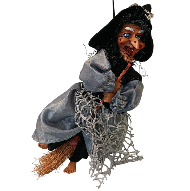 The Figurine: Kitchen Witch Doll – Sirene Silver (10.2" Tall) features a crooked nose, black hat, gray robe, and broomstick, holding a mesh net—an homage to Northern European folklore.