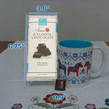 A 3.8-inch wide, 6.75-inch tall Sirius Icelandic Chocolate - 70% Dark Chocolate with Sea Salt bar stands beside a mug with Scandinavian horse designs, with a 0.9-inch square piece of chocolate in front.
