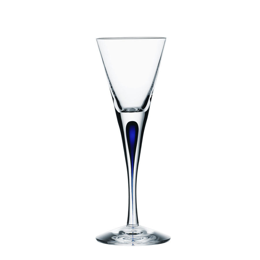 The Orrefors Intermezzo Blue Snaps 2oz glass, designed by Erika Lagerbielke, features a slender stem and subtle blue accent, showcasing the brands signature elegance.