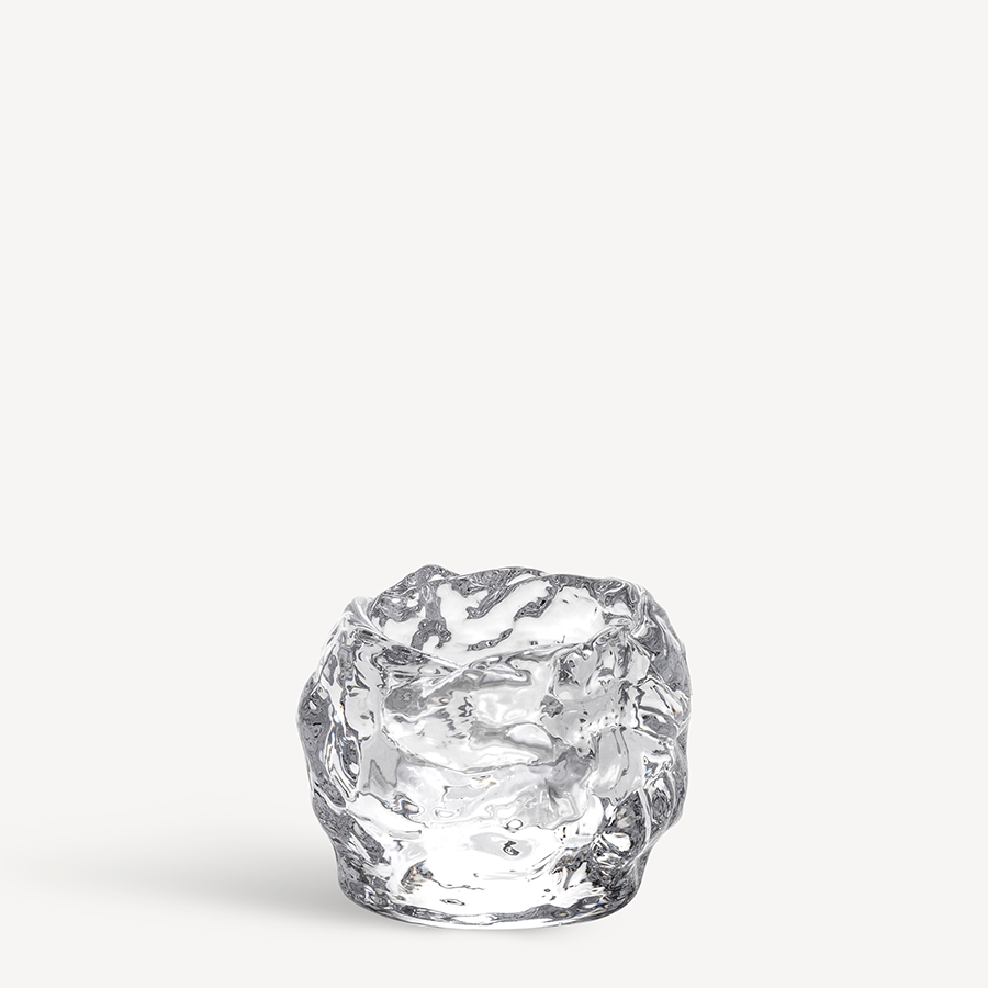 The KostaBoda: Snowball Votive Small 60mm by Ann Warff is a clear glass candle holder with an irregular, melting ice-like texture, reminiscent of the iconic design and shown against a plain white background.
