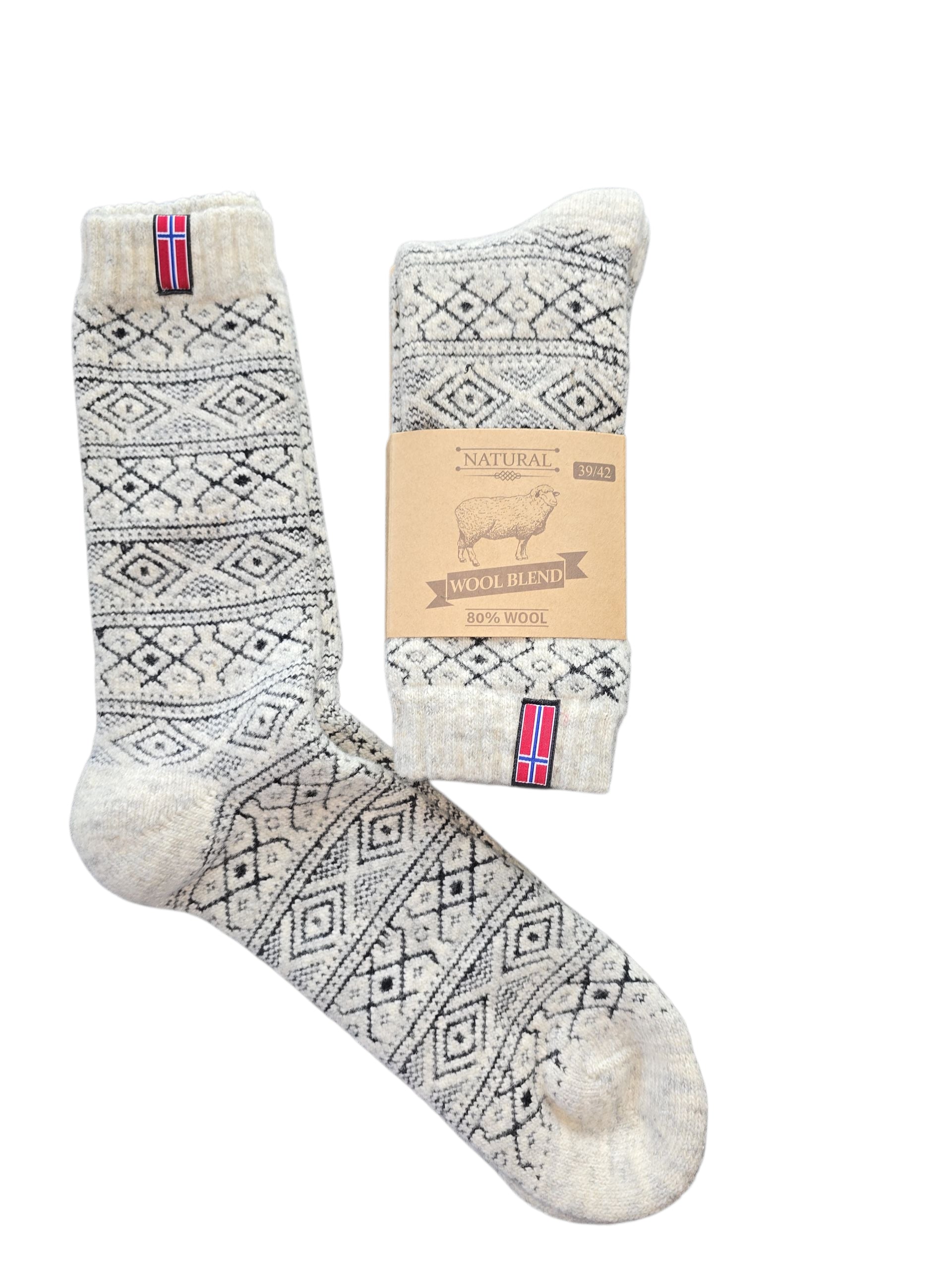 A pair of Wool Wear - Charcoal Norwegian Flag wool blend socks: one folded with a cardboard label and flag patch, the other flat to show the full Scandinavian winter design—perfect cozy comfort for cold weather.