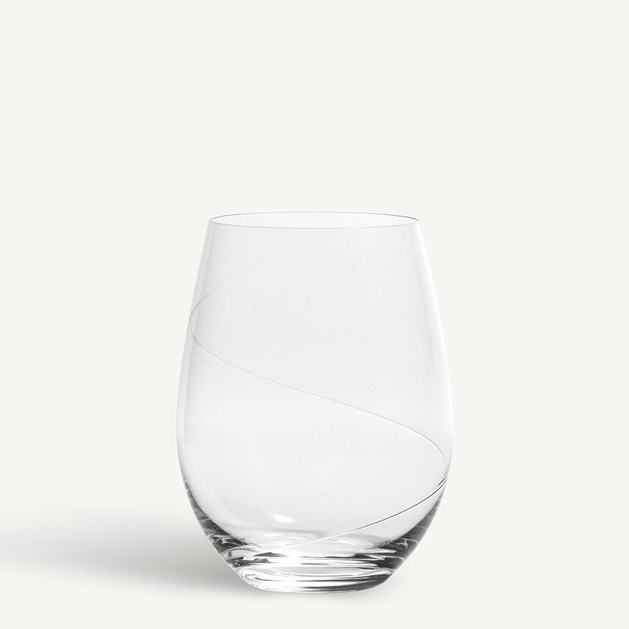 The KostaBoda: Line Stemless Glass features a clear design with a subtle diagonal swirl, highlighting exquisite Swedish craftsmanship.