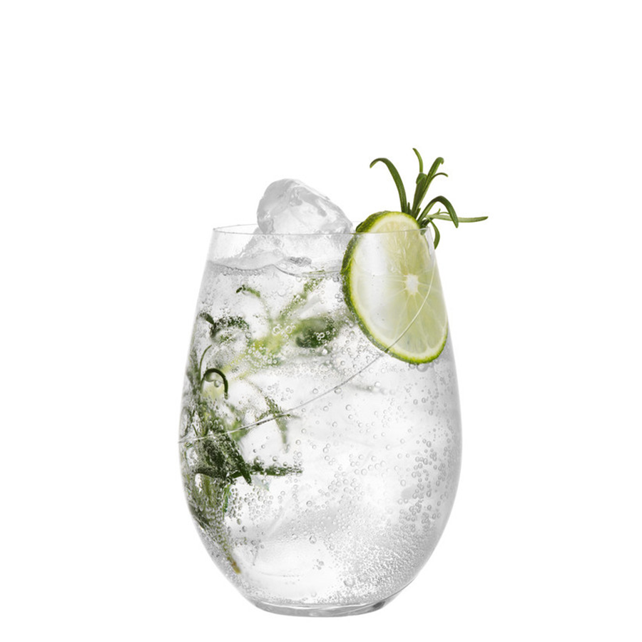 A KostaBoda: Line Stemless Glass 20oz of sparkling water with ice, lime slice, and rosemary sprig highlights Swedish craftsmanship.