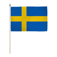 The Flag: Sweden – Polyester Flag with 24 wood stick pole (18x12) features a blue background with a yellow Nordic cross, crafted in durable polyester and mounted on a white wooden pole with gold tip.