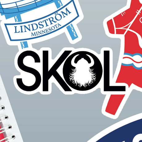 Sticker with a Viking helmet and “SKOL” lettering, surrounded by Nordic designs and Minnesota icons on a gray background.