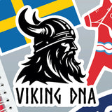 A striking black and white “Nordic Sticker: Viking DNA Sticker – Unleash Your Inner Warrior (3.45 x 4 Inches)” from Swedish Gift Store, featuring a bold Viking helmet and beard with the text “VIKING DNA,” displayed alongside vivid Nordic stickers inspired by the Swedish and Norwegian flags.