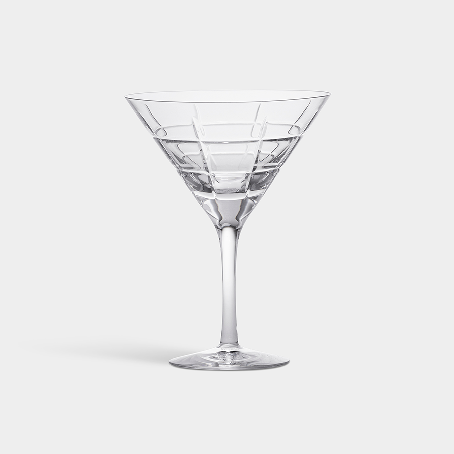 The Orrefors: Street Martini Glass, designed by Jan Johansson, features a clear, patterned design on a white background.