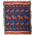 The Swedish Passport Co Blanket: Swedish Dala Horse 100% Cotton Woven Blanket (50"x60") features rows of red Dala horses and yellow fringe on a blue background—an ideal Nordic decor accent.