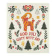 Scandinavian dishcloth with a red goat, green trees, red hearts, and floral motifs; text reads “God Jul! Gott Nytt År!”.