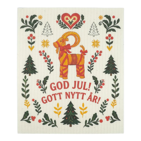 Scandinavian dishcloth with a red goat, green trees, red hearts, and floral motifs; text reads “God Jul! Gott Nytt År!”.