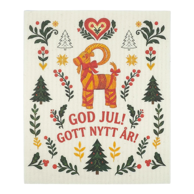 Scandinavian dishcloth with a red goat, green trees, red hearts, and floral motifs; text reads “God Jul! Gott Nytt År!”.