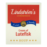 Soup can label with red, white, blue, and gold colors; text includes “Lindströms Condensed Extra Chunky Cream of Lutefisk Soup;” Swedish dishcloth-inspired design.