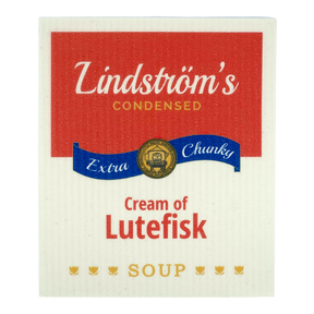 Soup can label with red, white, blue, and gold colors; text includes “Lindströms Condensed Extra Chunky Cream of Lutefisk Soup;” Swedish dishcloth-inspired design.