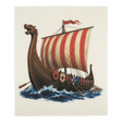 Swedish dishcloth showing a Viking longship with a dragon-headed prow, striped sail, round shields, oars, and blue waves.