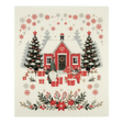 A Scandinavian-style dishcloth featuring a red house with snow, Christmas trees, gifts, a gnome, and a cat in a winter scene.