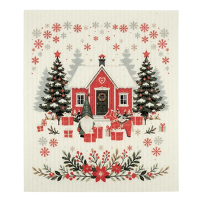 A Scandinavian-style dishcloth featuring a red house with snow, Christmas trees, gifts, a gnome, and a cat in a winter scene.