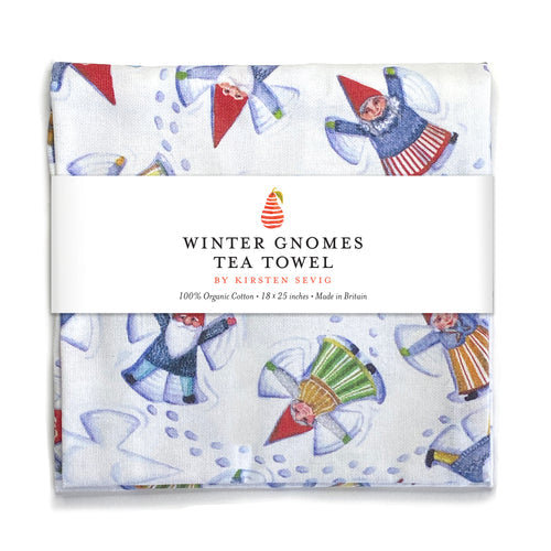 Tea towel crafted from organic cotton, featuring enchanting winter gnome illustrations inspired by Nordic folktales, packaged with a white band labeled Winter Gnomes Tea Towel by Kirsten Sevig.