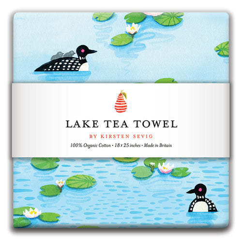 Enhance your home with the charm of Kirsten Sevigs Tea Towel: Lake Loons, featuring elegant loons and lily pads on a light blue background. Made in Britain from 100% organic cotton, its the perfect nature-inspired addition to your kitchen.