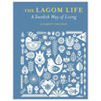 Book: The Lagom Life: A Swedish Way of Living by Elisabeth Carlsson features white folk art birds, flowers, and leaves on a blue cover, capturing the spirit of lagom and Swedish living.