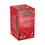 Red tea box decorated with white snowflakes and Finnish text, containing black tea flavored with cinnamon and cardamom.