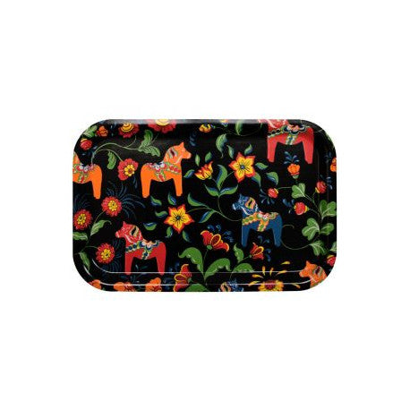 The Leksand Black Tray showcases orange, red, and blue Swedish Dala horses with colorful floral patterns by Carola Bengtsson-Malmstrom on a sleek black background.