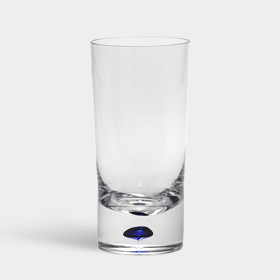 The Orrefors: Intermezzo Blue Tumbler 13oz, designed by Erika Lagerbielke, is a tall clear glass with a thick base and a subtle blue accent inside, contrasted against a plain gray background.