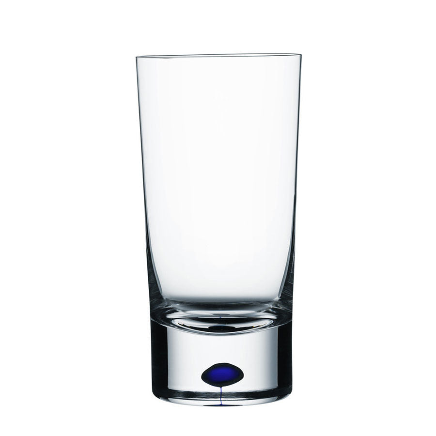 The Orrefors: Intermezzo Blue Tumbler 13oz, crafted by Erika Lagerbielke, boasts a clear glass build with a solid base and an elegant blue dot accent at the bottom.