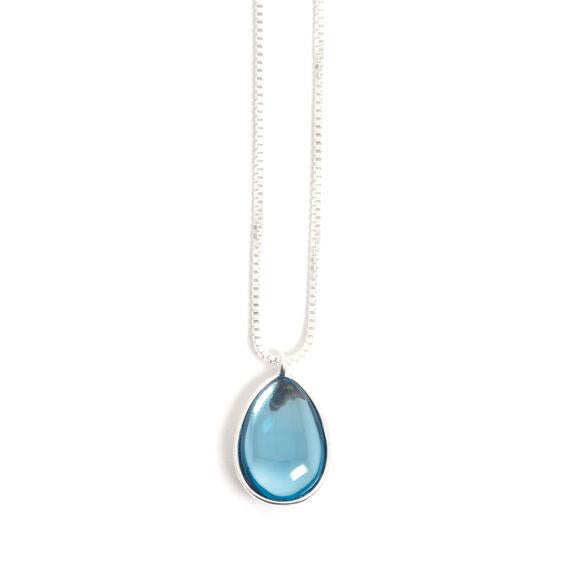 Necklace: Glass Drop Blue by A&C Norway, showcasing a stunning blue glass drop pendant, meticulously crafted from hand-ground glass.