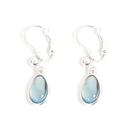 Introducing the Earrings: Glass Drop Blue A&C Norway French Clip, a stunning pair of silver-plated earrings adorned with hand-ground blue glass pendants set against a white backdrop.