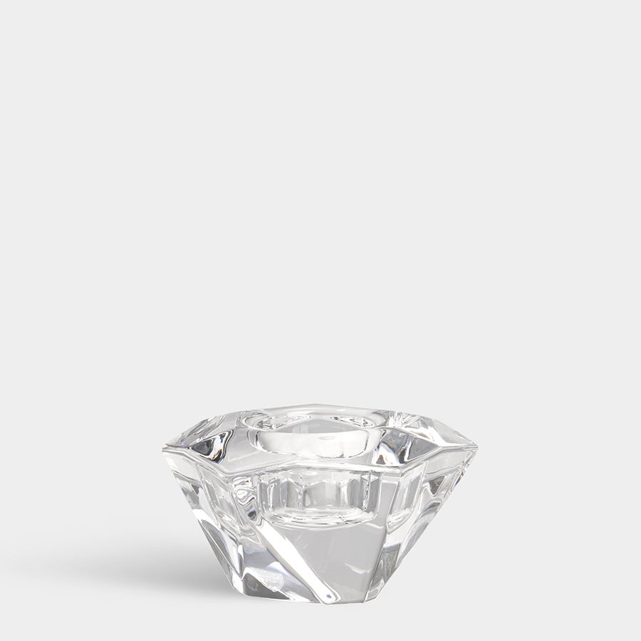 The Orrefors: Precious Votive Candle Holder by Malin Lindahl showcases a crystal-clear, faceted design with geometric elegance against a plain white background.