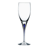 Designed by Erika Lagerbielke, the Orrefors Intermezzo Blue White Wine Glass 6oz is a tall, clear glass with a slender stem and subtle blue tint at the base.