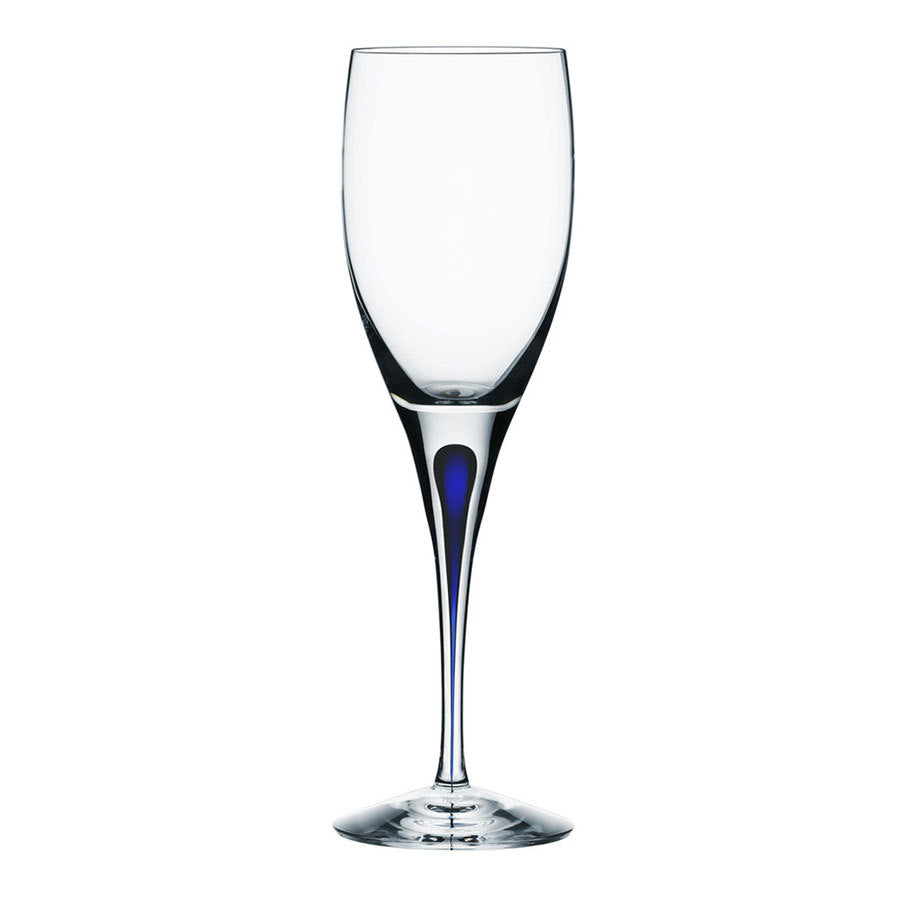 Designed by Erika Lagerbielke, the Orrefors Intermezzo Blue White Wine Glass 6oz is a tall, clear glass with a slender stem and subtle blue tint at the base.