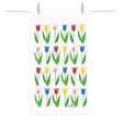 A Tulip Terry Cotton Hand Towel (12" x 20") with a grid of colorful stylized tulips, inspired by Anneko Design Sweden, is displayed hanging from two clothespins on a line.