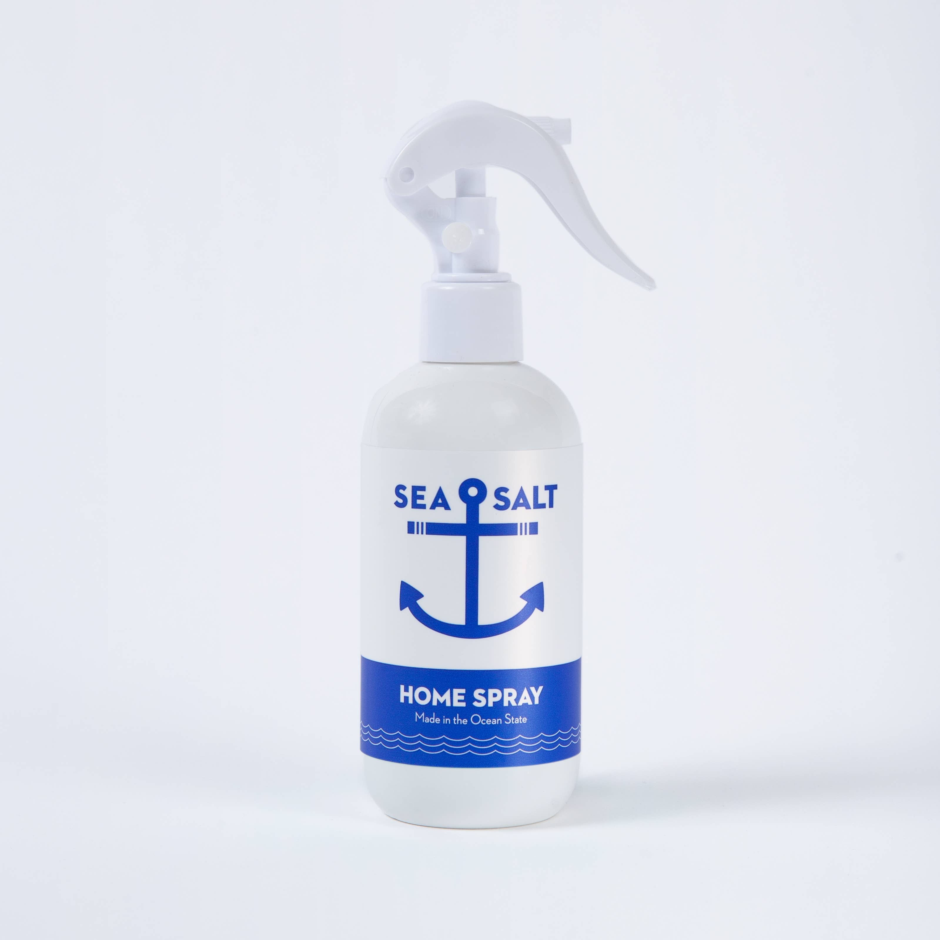 A white spray bottle labeled Home Fragrance: Swedish Dream® Sea Salt Home Spray 8 fl oz, featuring a blue anchor graphic and “Made in the Ocean State,” offers an ocean air scent. This cruelty-free product is shown on a white background.