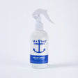 A white spray bottle labeled Home Fragrance: Swedish Dream® Sea Salt Home Spray 8 fl oz, featuring a blue anchor graphic and “Made in the Ocean State,” offers an ocean air scent. This cruelty-free product is shown on a white background.