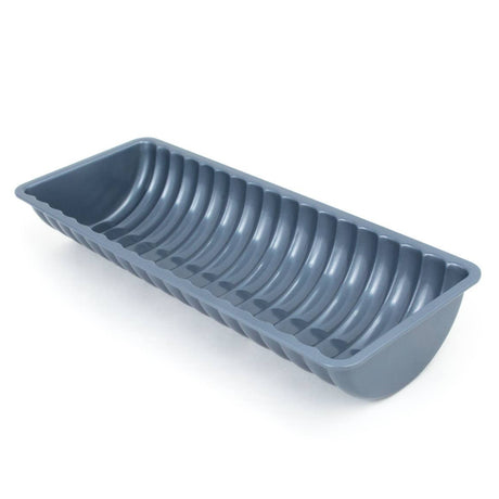 The Pan: Rehrucken / Almond Cake Loaf Pan is a gray, rectangular non-stick pan with curved edges and a ribbed design, ideal for baking bread, cakes, or classic almond cake Rehrucken. Shown on a white background.