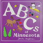 The ABC’s of Minnesota children's book artfully features regional landmarks with charming illustrations of moose, trees, stars, berries, a rabbit in a canoe, and a heart on a purple background.