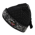 The Norlender Knitwear Black Snowflake Beanie is a black and white knitted winter wool hat showcasing a snowflake pattern, with a logo displayed on the front.
