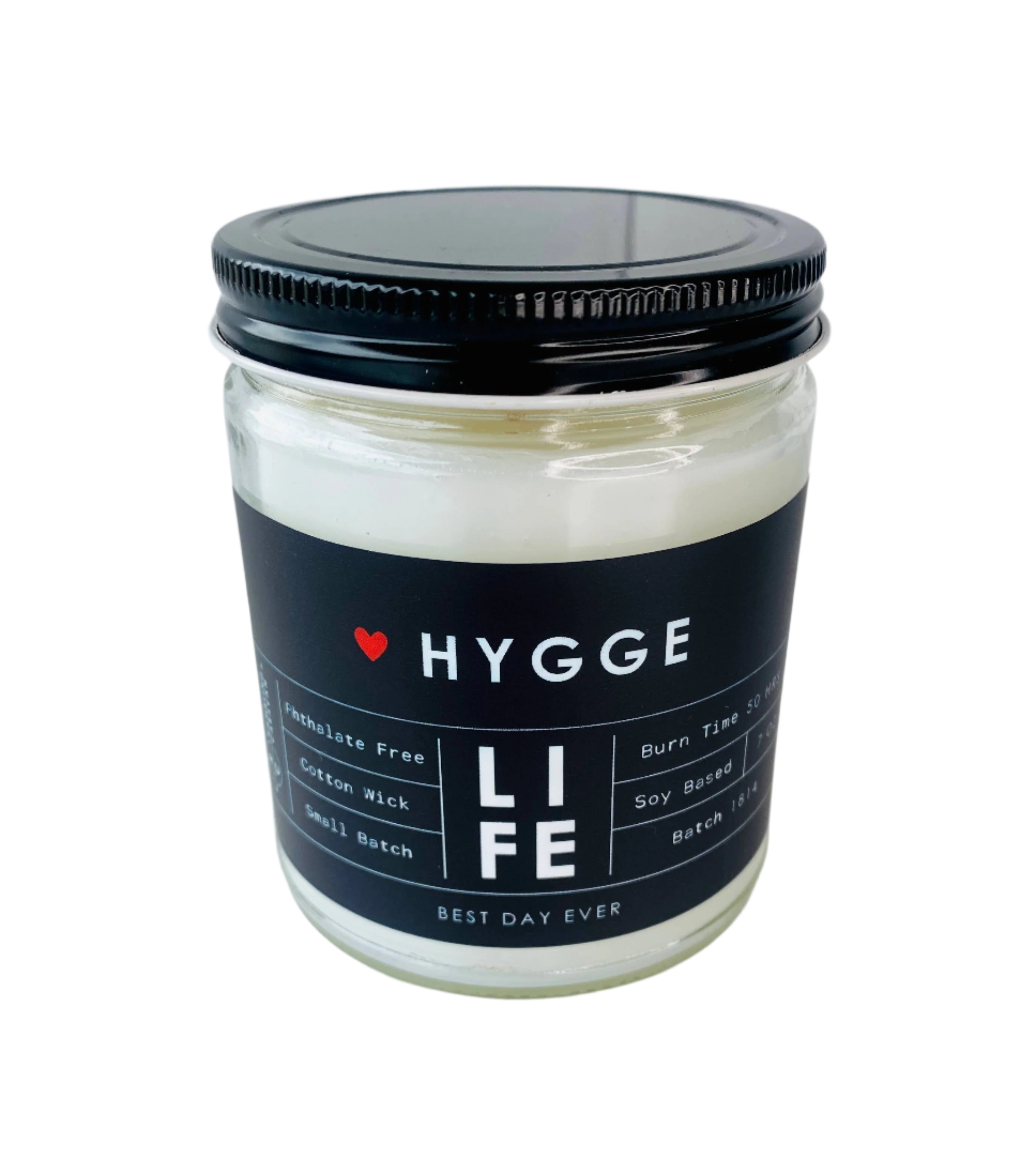 A Candle: Hygge (Danish for comfort) with a black label, clear jar, and sea salt & orchid scent. Made in small batches (Batch 14), phthalate-free, cotton wick, soy-coconut wax, 50h burn time.