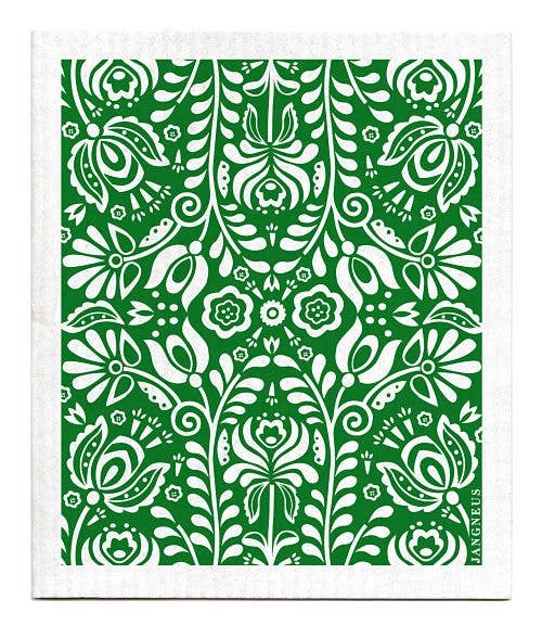 The Scandi Bloom - Green dish cloth features a green and white floral patterned design with symmetrical leaf and flower motifs, offering both style and functionality as it is absorbent and biodegradable.