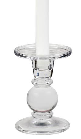 A glass dual-size candle holder (5") beautifully showcases a white taper candle, emitting a warm glow.