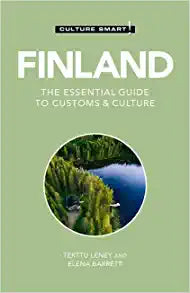 The book cover titled *Finland The Essential Guide to Customs & Culture* from the Culture Smart series by Terttu Leney and Elena Barrett showcases a forested landscape with a lake, encapsulating the essence of sisu and exploring the Finnish psyche.